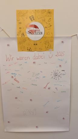 Heiss auf Lesen 2025 Wir waren dabei Unterschriften von vielen Kindern auf Plakat